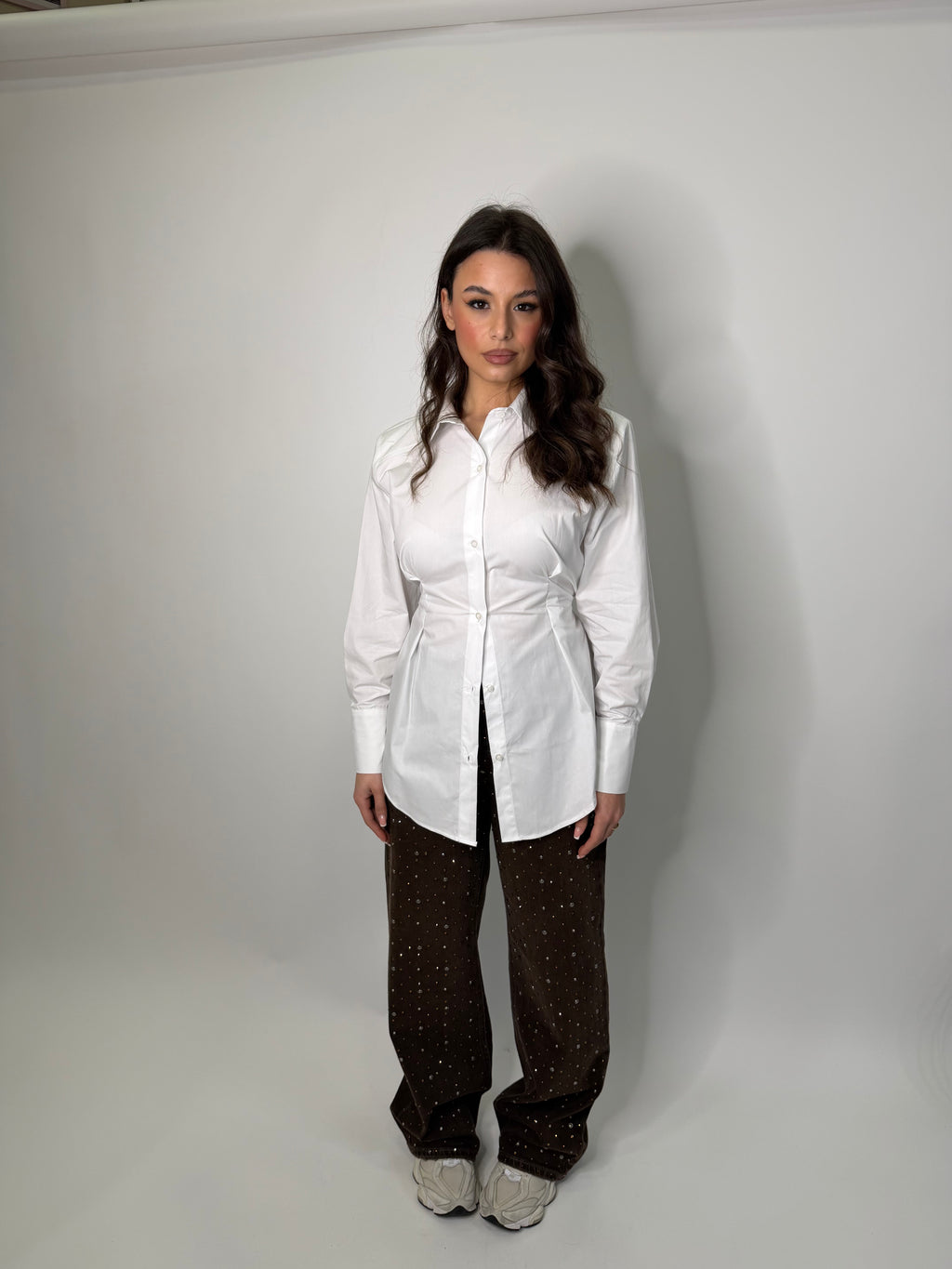 Jeans marroni con strass