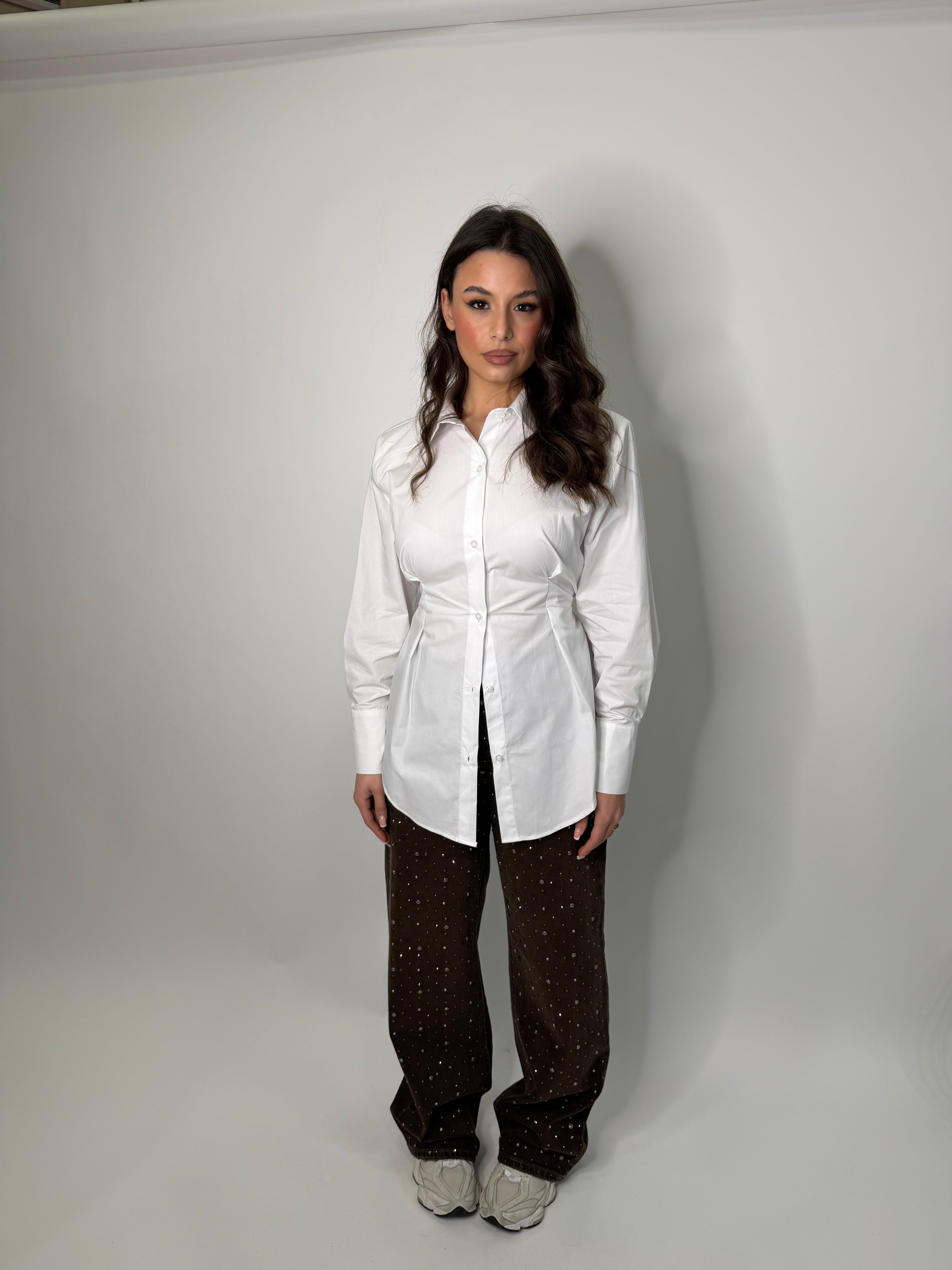 Jeans marroni con strass