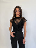 Maglia in pizzo con volant